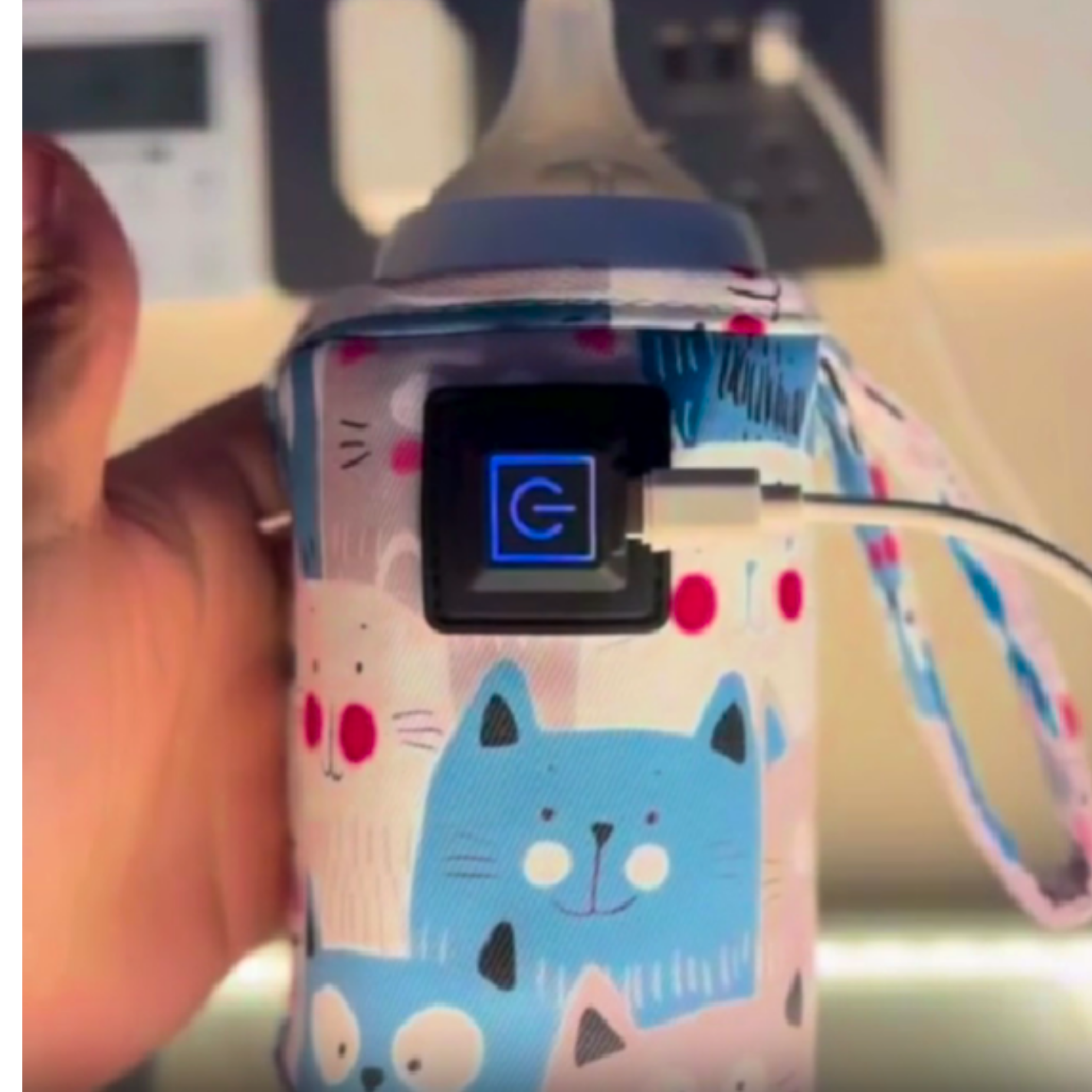 MilkyGo scaldabiberon USB in uso mamma e bambino